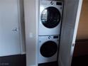 Conveniently stacked washer and dryer units in a dedicated closet at 322 Karen Ave # 2606, Las Vegas, NV 89109