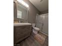 Well-maintained bathroom featuring a stylish vanity, a toilet, and a walk-in shower at 460 Elm Dr # 103, Las Vegas, NV 89169