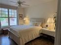 Bright bedroom with a large window and calming neutral tones at 5855 Valley Dr # 1070, North Las Vegas, NV 89031