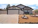 Attractive single-story home with a two-car garage and low maintenance gravel landscaping at 806 Fireweed Dr, Henderson, NV 89002