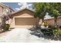 Charming single-story home with a two-car garage and simple landscaping in a residential neighborhood at 820 Bernini St, Las Vegas, NV 89144