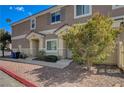 Cozy single-story home with well-maintained landscaping, a stone pathway, and a welcoming entrance at 1073 Pleasure Ln # 2, Henderson, NV 89002