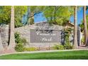 Elegant stone entrance sign for the Camden Park community with manicured landscaping at 1274 Doggett Ave, Las Vegas, NV 89123