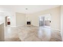Bright living room with fireplace and tile flooring throughout at 2050 W Warm Springs Rd # 4322, Henderson, NV 89014