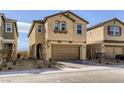 Two-story home showcasing a well-maintained front yard and attached two-car garage at 2417 Fasano St, Henderson, NV 89044