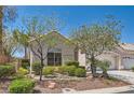 Charming single-story home features a two-car garage, neutral paint and desert landscaping at 2889 Anteres St, Las Vegas, NV 89117
