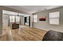 Bright living room showcasing wood floors, built-in shelving, and lots of natural light at 401 Sonoma Valley St, Las Vegas, NV 89144