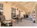 Inviting outdoor patio space with comfortable seating, perfect for relaxation and entertaining at 5028 Glenarden Dr, Las Vegas, NV 89130