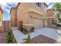 Charming two-story home with a neutral exterior, private gate, and low-maintenance landscaping at 6387 Azurelyn Ave, Las Vegas, NV 89122