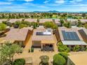 A private backyard with desert landscaping and a covered patio perfect for outdoor living at 7669 Fieldfare Dr, North Las Vegas, NV 89084