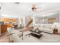 Bright and airy living space featuring a seamless flow to the kitchen and dining area at 977 Courtney Valley St, Henderson, NV 89052