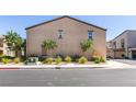 Back exterior featuring a well-maintained landscape, showcasing the beauty of the surrounding neighborhood at 1200 Mission View Ct, Henderson, NV 89002