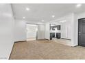 Open living space offering seamless transitions between the living room, sunroom and kitchen at 1390 Vegas Valley Dr # 32, Las Vegas, NV 89169