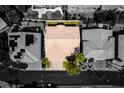 Aerial view of a well-maintained home featuring a tile roof, mature landscaping, and a large, private backyard at 2090 Eaglepath Cir, Henderson, NV 89074