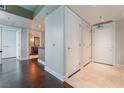 Hallway with hardwood floors, multiple closets, and views into the bathroom and main living area at 2700 Las Vegas Blvd # 610, Las Vegas, NV 89109