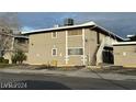 Apartment complex with a two-story unit offering an inviting staircase at 304 Orland St # 39, Las Vegas, NV 89107
