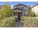 Charming home with well-manicured landscaping and a welcoming front porch at 3132 Cartanda Ave, Henderson, NV 89044