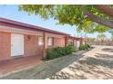 Cozy single-story home with a covered front porch and well-maintained landscaping at 3250 Duneville St, Las Vegas, NV 89146