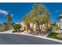 Charming single-story home surrounded by mature trees and desert landscaping at 10361 Profeta Ct, Las Vegas, NV 89135