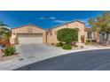 Lovely single-story home featuring desert landscaping and an attached two-car garage at 10361 Profeta Ct, Las Vegas, NV 89135