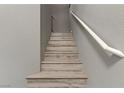 Stairway features wood look plank steps and light neutral paint at 1150 Red Margin Ct # 101, Las Vegas, NV 89183