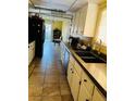 Functional kitchen with ample counter space, tile floors, and modern appliances at 3382 Berwyck St, Las Vegas, NV 89121
