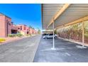 View of a covered parking area for residents, providing shelter from the elements at 4050 Pacific Harbors Dr # 245, Las Vegas, NV 89121