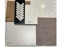 A curated selection of interior design materials, including cabinetry, flooring, and quartz countertops at 4180 E Brusca Way, Pahrump, NV 89061