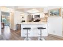 Modern kitchen with stainless steel appliances and bar seating for casual dining at 515 Kristin Ln, Henderson, NV 89011