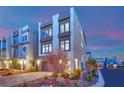 Charming three-story home boasting a modern design with a private rooftop deck, and manicured landscaping at 8178 Eaton Hill St, Las Vegas, NV 89113