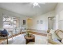 Bright living room with vaulted ceiling and views of the front yard at 1012 Winwood St, Las Vegas, NV 89108