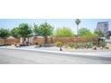 Landscaped front exterior with modern fence, showcasing desert landscaping and a charming single-story house at 108 Verdy Ln, Las Vegas, NV 89101