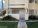 Charming condo with desert landscaping, private entrance, and convenient access to upper-level units via exterior stairs at 1105 Sulphur Springs Ln # 102, Las Vegas, NV 89128