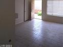 Open living space with tiled floors and plenty of natural light at 1608 N Torrey Pines Dr # 103, Las Vegas, NV 89108