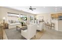 Bright and airy living room features an open floor plan with access to the backyard at 2538 Capella Star St, Henderson, NV 89044