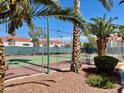 A community tennis court with a green surface for recreational play at 2725 S Nellis Blvd # 1158, Las Vegas, NV 89121