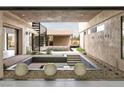 Stunning courtyard featuring a pool, spiral staircase, and modern desert landscaping at 3510 Cosima Ln, Las Vegas, NV 89120