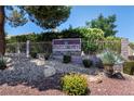 Attractive stone and sign for the Glenden Arden Village community, landscaped with shrubbery at 4904 Wiltondale Way, Las Vegas, NV 89130