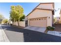 Spacious two-car garage with automatic door and extra parking space at 2037 Brush Stroke St, Henderson, NV 89044