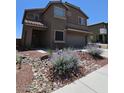 Charming two-story house with a low-maintenance yard in a desirable neighborhood at 2077 Alki Beach Ave, Laughlin, NV 89029
