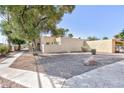 Exterior showcasing a desert landscaped front yard and stucco home at 45 N Lamb Blvd, Las Vegas, NV 89110
