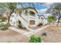 Charming condo complex featuring well-maintained landscaping and inviting curb appeal at 5655 E Sahara Ave # 1052, Las Vegas, NV 89142