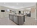 Spacious kitchen featuring a large center island with modern appliances and ample counter space at 625 Honesty Ct, Henderson, NV 89011