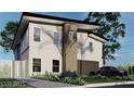 Well landscaped two-story modern home with an integrated two-car garage and black accents at 6503 Adrian Ridge Ct, Las Vegas, NV 89149