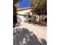 Garage and driveway offering ample parking at 7255 W La Madre Way, Las Vegas, NV 89149