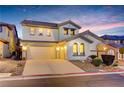 Charming two-story home with desert landscaping and a two car garage, offering curb appeal at 733 Secret London Ave, Las Vegas, NV 89178