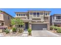 Charming two-story home featuring a stone-accented facade, well-manicured landscaping, and a two-car garage at 10506 Arnica Way, Las Vegas, NV 89135