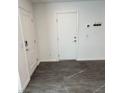 View of a entryway featuring a modern doors and wood-look floors at 12170 Midnight Pine Rd # 3, Las Vegas, NV 89183