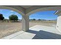 Covered front porch featuring sturdy support beams that add to the appeal at 1580 S Tiptop Trl, Pahrump, NV 89048