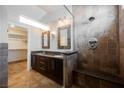 Ensuite bathroom features dual sinks and a spacious walk-in shower at 209 Camino Vista St, Henderson, NV 89012